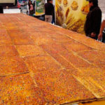 Elaboran en Cusco la empanada dulce más grande del mundo